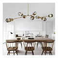 Luminaire Dore et Ambre a silhouette graphique de type suspension E27