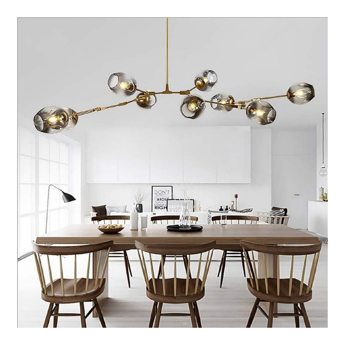 Luminaire Dore et Ambre a silhouette graphique de type suspension E27